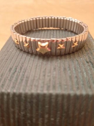 Pulsera elastica acero y oro 18 kl