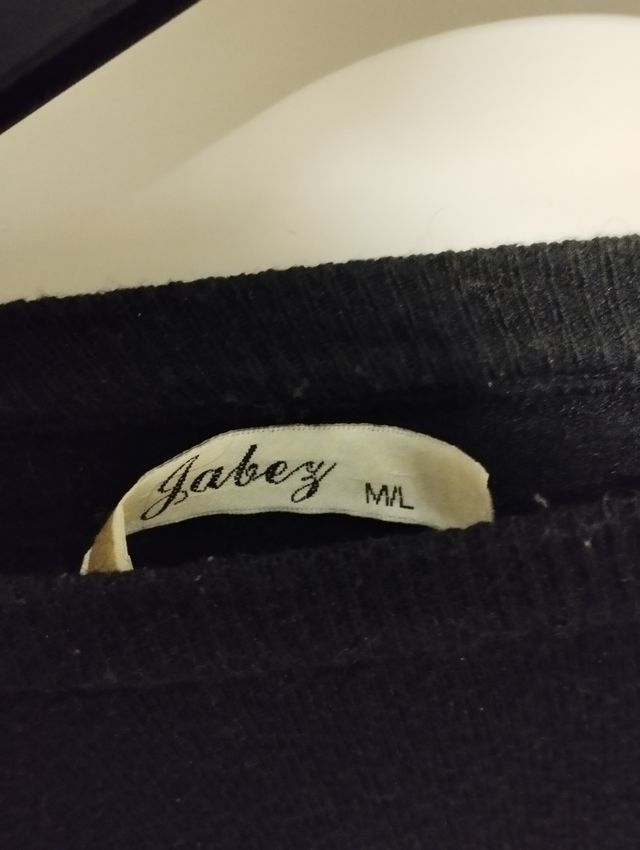 Lote de dos jerseys negros y un vestido