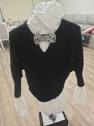 Jersey negro piedras