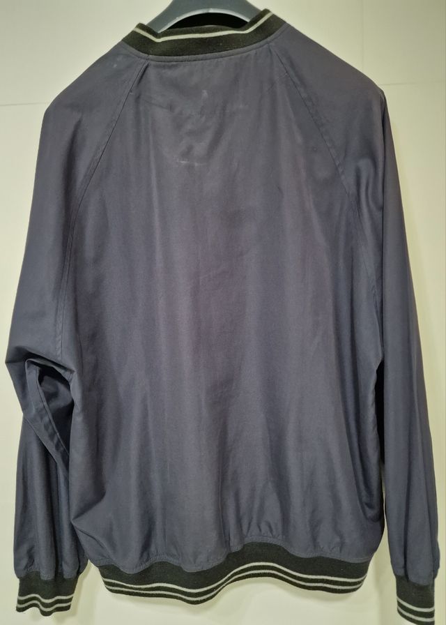 Burberry Golf. Talla L.