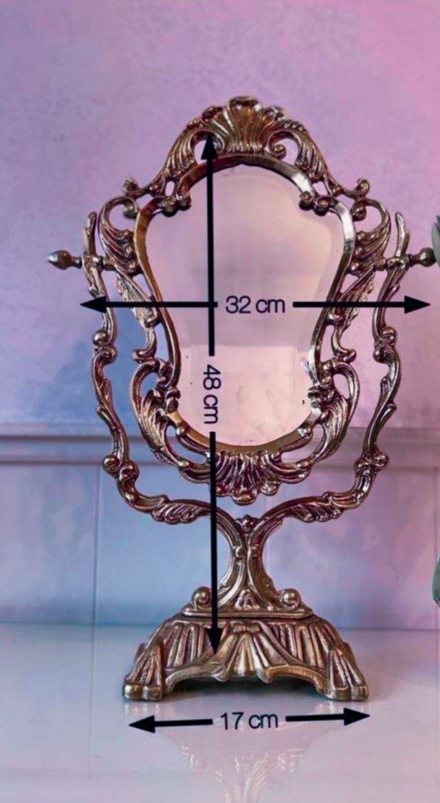 Espejo de tocador en bronce tallado