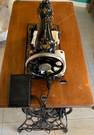 maquina de coser portatil Singer