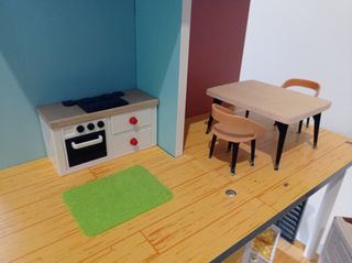 Casa de muñecas de madera