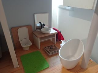 Casa de muñecas de madera