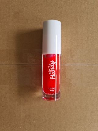 Brillo de labios con color Merci Handy