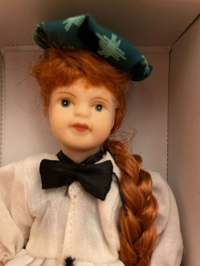 Pintora muñeca de porcelana colección