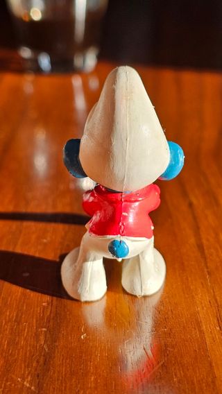 Puffo che suona il flauto The smurfs