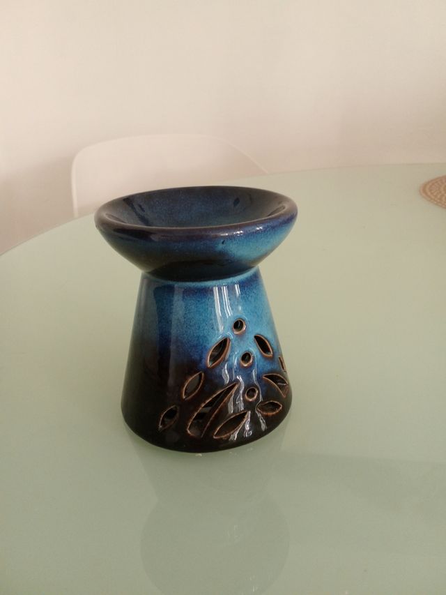 Porta candela con bruciatore per olio