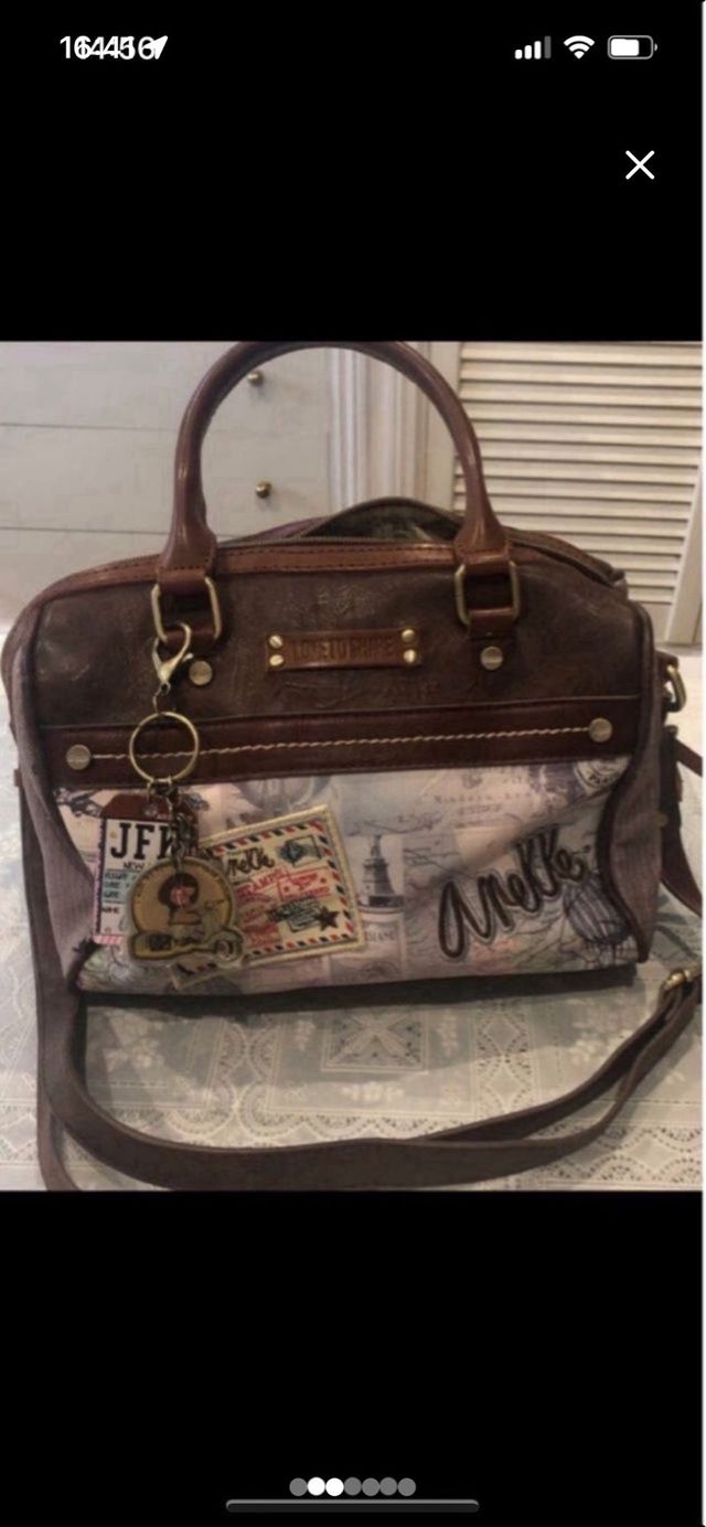 Bolso Anekke  y bolsa para guardarlo