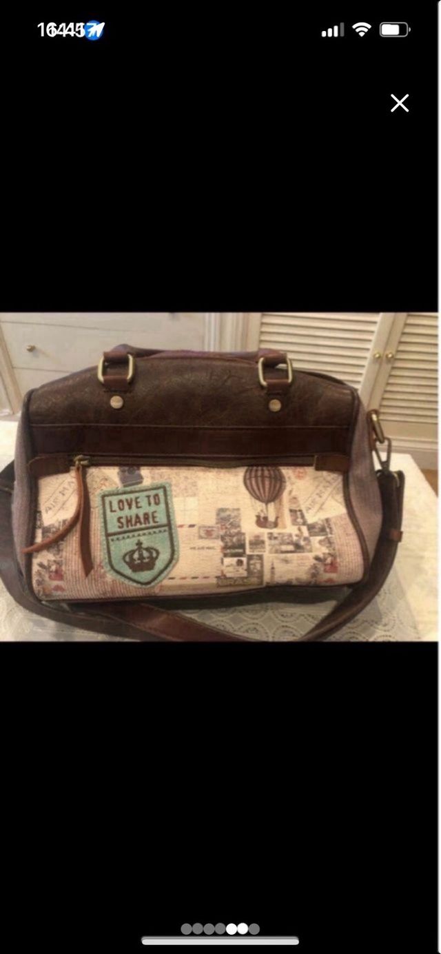 Bolso Anekke  y bolsa para guardarlo