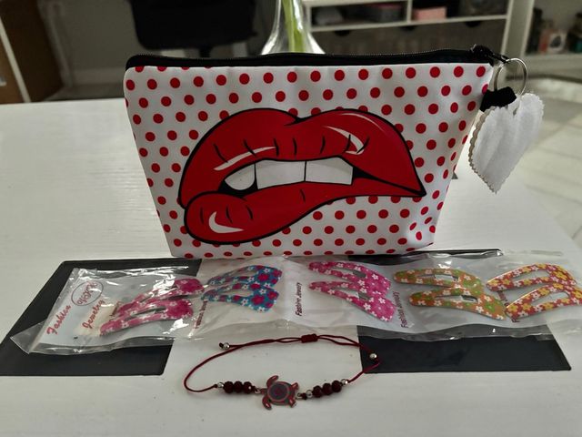 Lote neceser orquillas pulsera