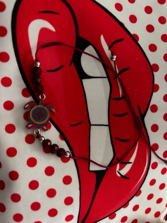 Lote neceser orquillas pulsera