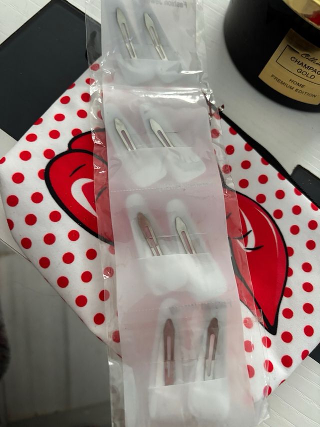 Lote neceser orquillas pulsera