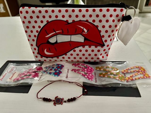 Lote neceser orquillas pulsera