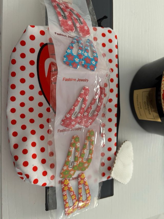 Lote neceser orquillas pulsera