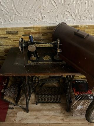 Máquina de coser singer centenaria