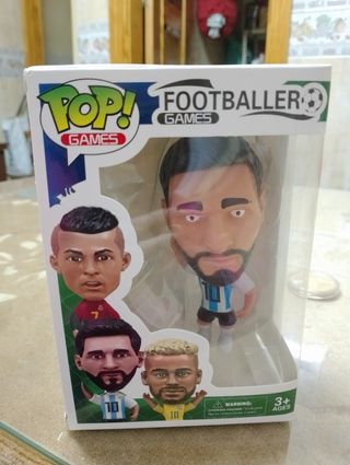 Funko de Messi y medalla