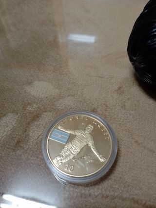 Funko de Messi y medalla