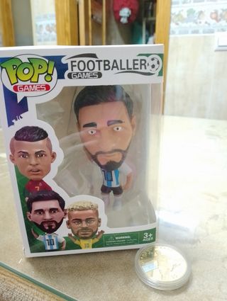 Funko de Messi y medalla