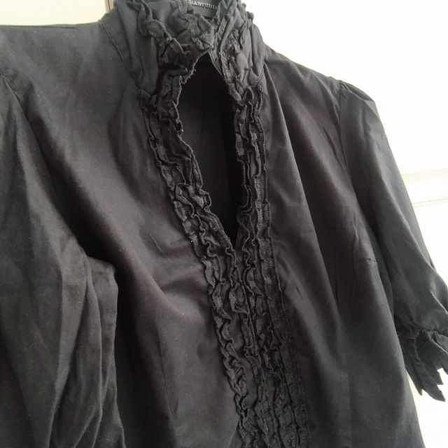 Blusa negra cuello alto 