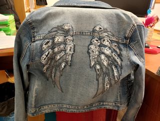 Cazadora vaquera con alas