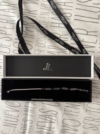 Pulsera plata primera ley Jose Luis 
