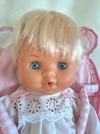 Muñeca y portabebés "Falca"