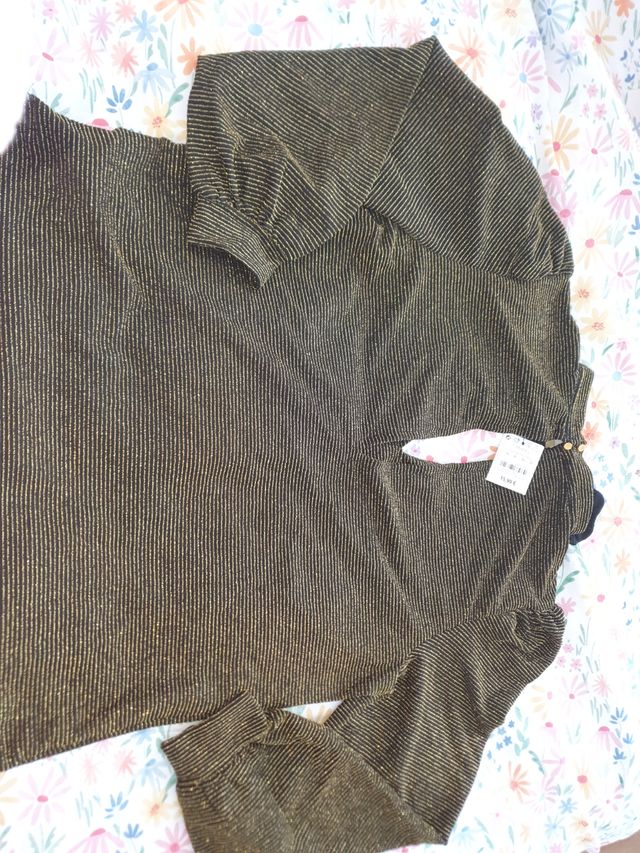 Camiseta mujer brillo dorado esfera.