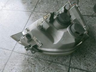 Faro izquierdo Nissan interestar