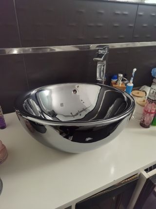 Lavabo roca con grifo roca
