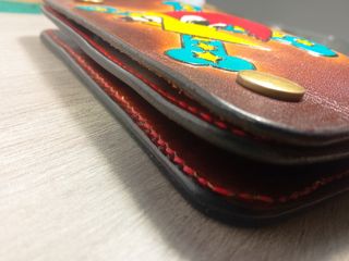 Cartera biker de cuero"Pájaro Loco"