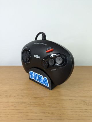 Soporte para mando Sega Mega Drive 2