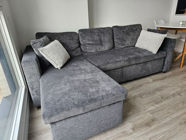 Sofá reversible NUEVO gris oscuro.