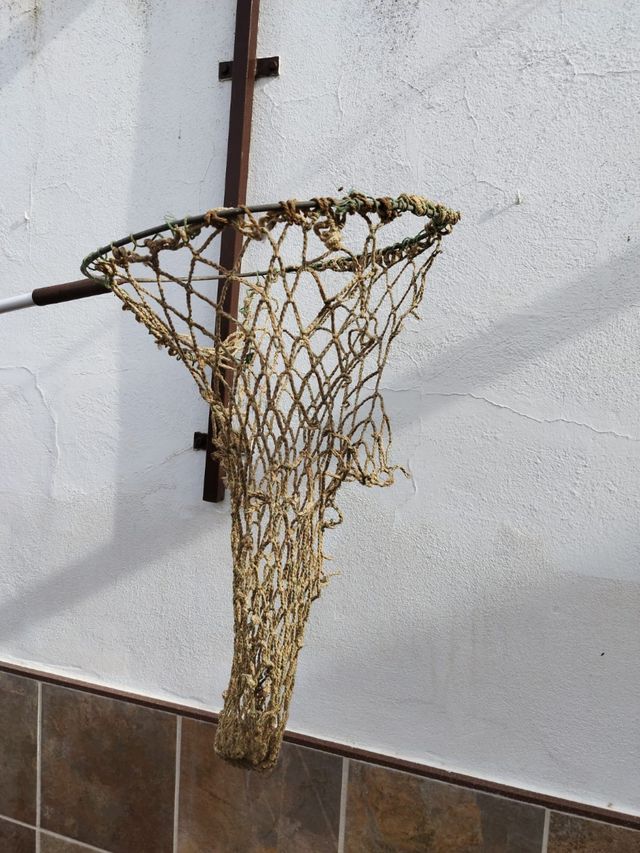 Recogedor de peces de cuerda muy antiguo