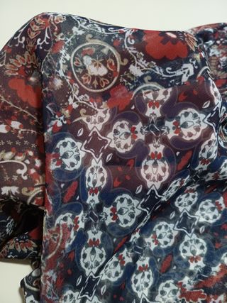 Blusa semitransparente Trucco