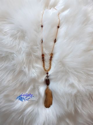 Collar pluma