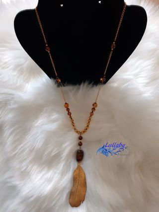 Collar pluma