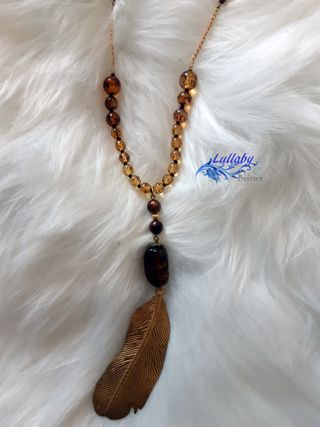 Collar pluma