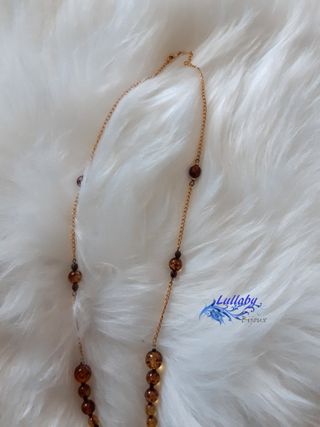 Collar pluma