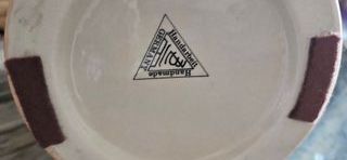 Jarrón y macatero chino