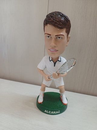 statuette gongolo testa oscillante vari personaggi