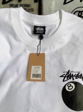 Stussy manga corta