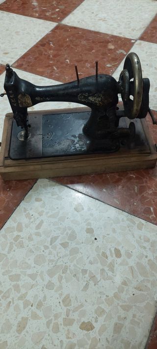 maquina coser antigua