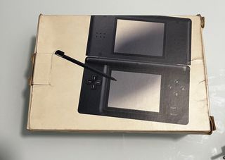 Nintendo DS Lite con caja, manuales y 2 juegos