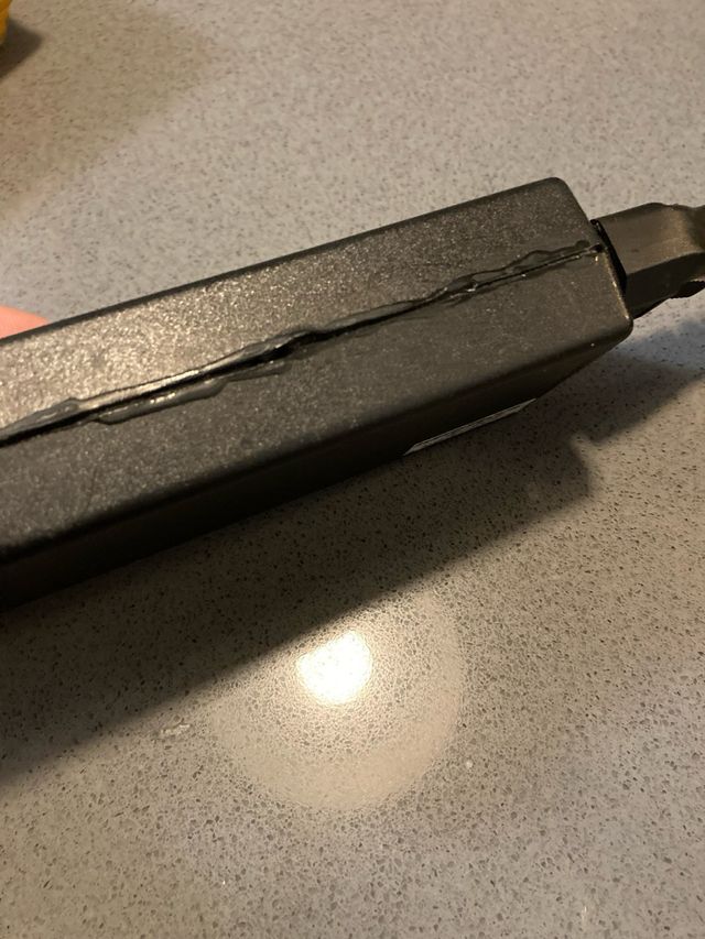 Cargador HP reparado 