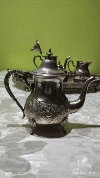 Juego de cafe con baño de plata