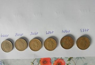 Monedas de 100 pesetas. 