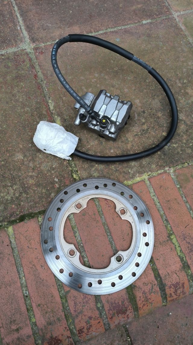 Pinza+latiguillo mas disco original para Honda Shi