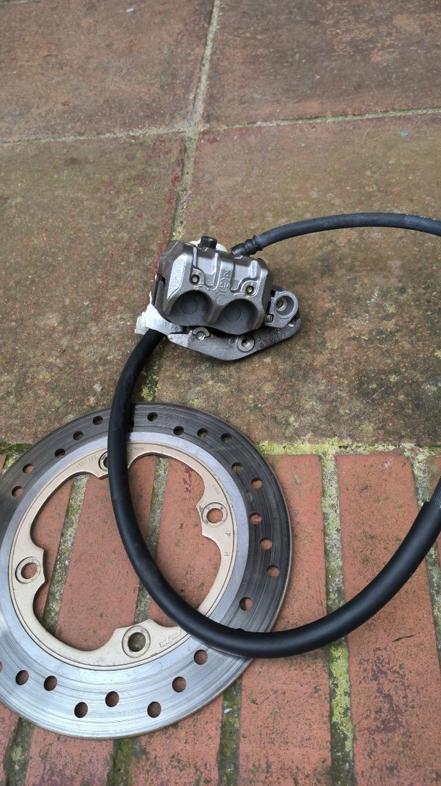 Pinza+latiguillo mas disco original para Honda Shi