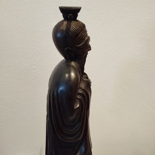 Antigua escultura china de madera tallada